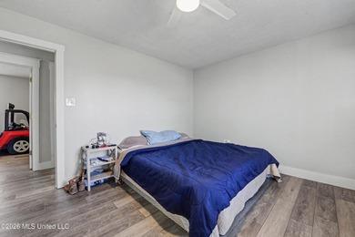 This spacious 4-bedroom, 2 bath home with a bonus room situated - photo 9