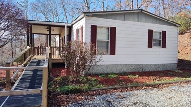 Charming 3-bedroom, 2-bath home located less than  mile up Caney