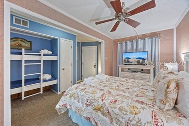 This well-maintained one-bedroom oceanside villa is located - photo 11