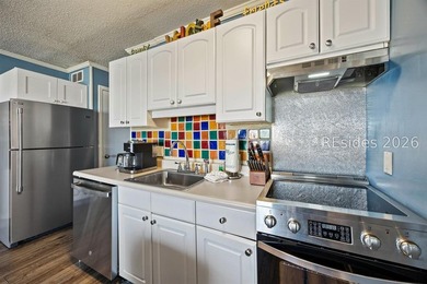 This well-maintained one-bedroom oceanside villa is located - photo 25