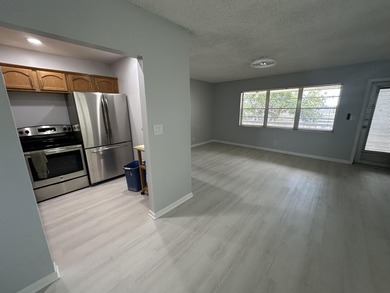 Beautiful and bright corner unit renovated overlooking the - photo 3