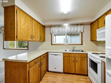 Located in the sought-after Woodburn Senior Estates, this home - photo 11