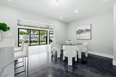 Welcome to this exceptional single-story residence in Palm Beach - photo 9