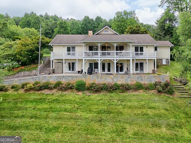 This beautiful, expansive, 4 bedroom, 5.5 bath home with a - photo 1
