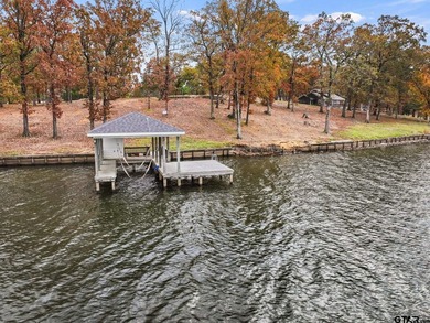 Nestled in the prestigious Hills Point lake community, this - photo 11