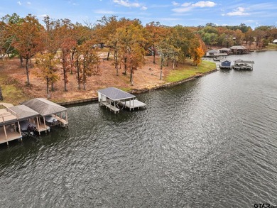 Nestled in the prestigious Hills Point lake community, this - photo 12