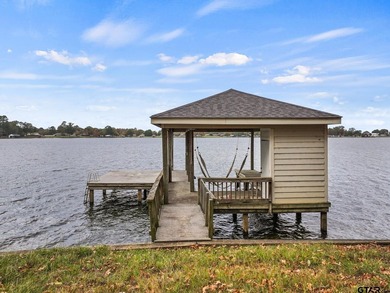 Nestled in the prestigious Hills Point lake community, this - photo 16