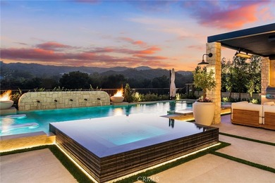 Golf course living doesn't get much better than this. Positioned - photo 1