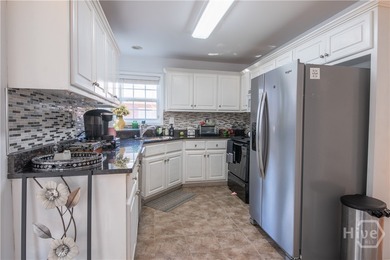 Charming and low-maintenance, this all-brick two-story home is - photo 8
