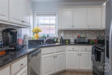 Charming and low-maintenance, this all-brick two-story home is - photo 9