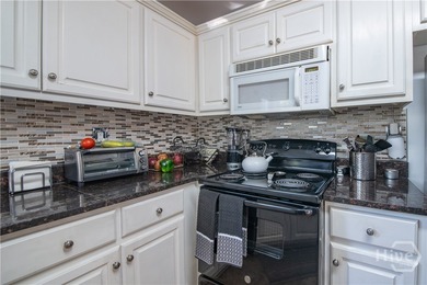 Charming and low-maintenance, this all-brick two-story home is - photo 10