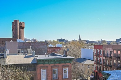 This classic four-story brownstone with beautiful architectural - photo 11