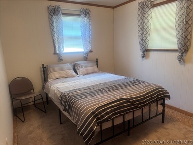 This property is ready for LAKE FUN. This lake access cabin has