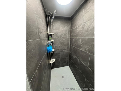 This property is ready for LAKE FUN. This lake access cabin has