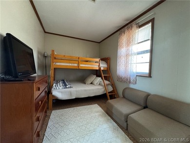 This lake access cabin is perfect for the serious fisherman or - photo 27