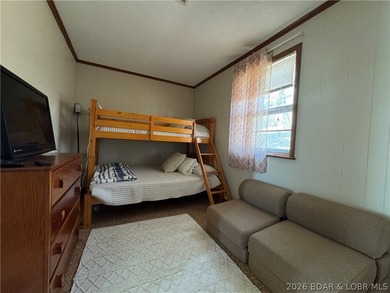 This lake access cabin is perfect for the serious fisherman or - photo 28