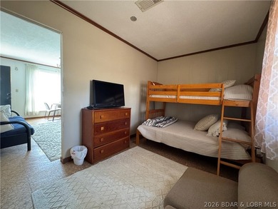 This lake access cabin is perfect for the serious fisherman or - photo 29