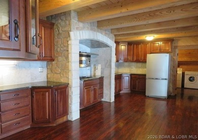 A VIEW FOR MILES! This one-of-a-kind custom log home showcases - photo 14
