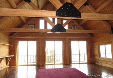 A VIEW FOR MILES! This one-of-a-kind custom log home showcases - photo 21