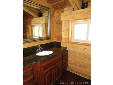 A VIEW FOR MILES! This one-of-a-kind custom log home showcases - photo 23