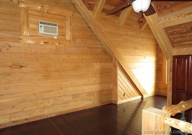 A VIEW FOR MILES! This one-of-a-kind custom log home showcases - photo 25
