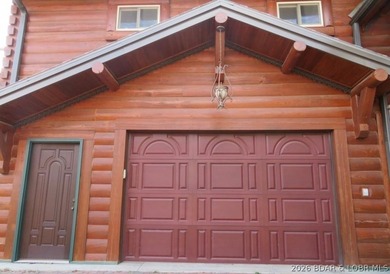 A VIEW FOR MILES! This one-of-a-kind custom log home showcases - photo 30