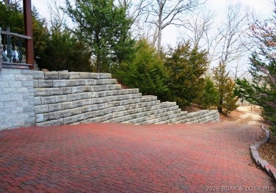 A VIEW FOR MILES! This one-of-a-kind custom log home showcases - photo 32
