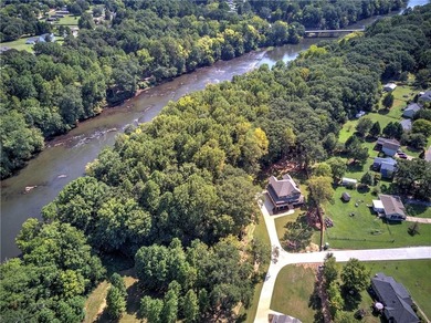 Welcome home to your gated retreat by the river! Luxury Living - photo 2