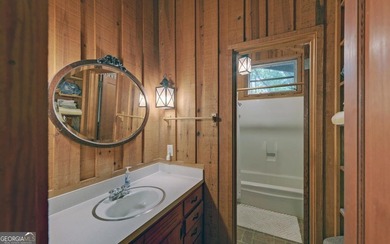 A Rare Lake Lanier Retreat on 4.24 Private Acres in a Deepwater - photo 16