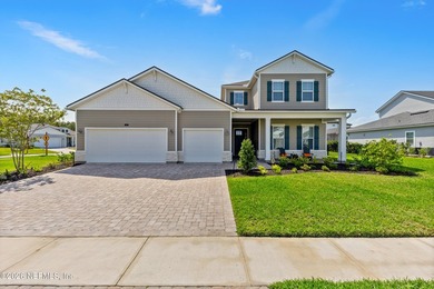 THIS HOME FEELS BRAND NEW! Located on a rare .38-acre fully - photo 1