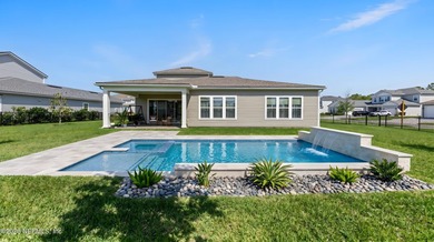 THIS HOME FEELS BRAND NEW! Located on a rare .38-acre fully - photo 2