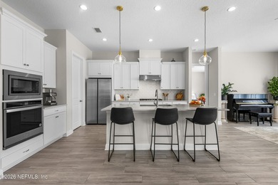 THIS HOME FEELS BRAND NEW! Located on a rare .38-acre fully - photo 7