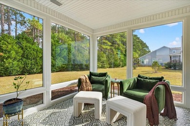 Enjoy the ease of low-maintenance coastal living in one of - photo 2