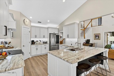 Enjoy the ease of low-maintenance coastal living in one of - photo 7