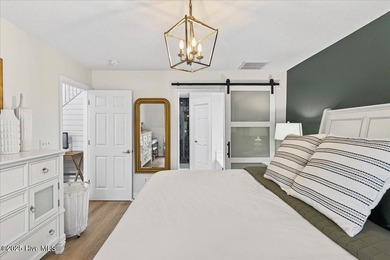 Enjoy the ease of low-maintenance coastal living in one of - photo 10