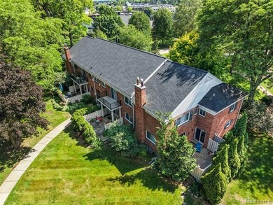 2-bedroom condo is nestled in a quiet neighborhood. The exterior - photo 1