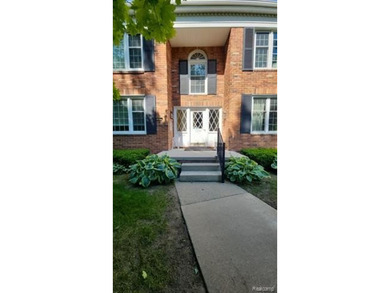 2-bedroom condo is nestled in a quiet neighborhood. The exterior - photo 2