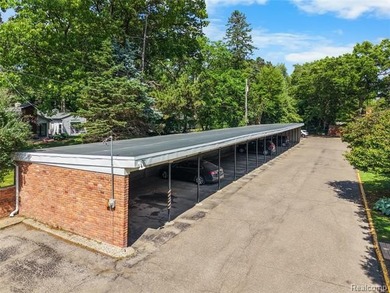 2-bedroom condo is nestled in a quiet neighborhood. The exterior - photo 7