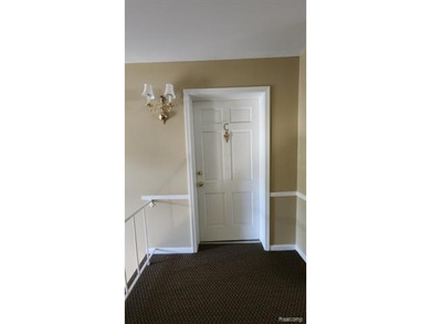 2-bedroom condo is nestled in a quiet neighborhood. The exterior - photo 9