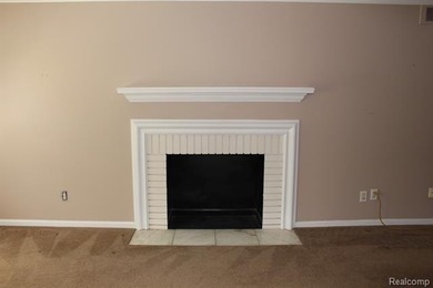 2-bedroom condo is nestled in a quiet neighborhood. The exterior - photo 10