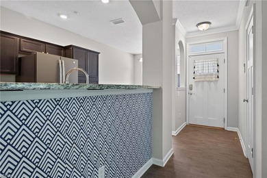 Enjoy easy one-level living in the sought-after Promenade at - photo 4