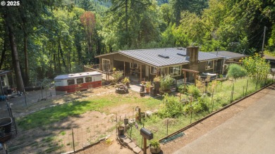 Lake Home For Sale in Swisshome, Oregon