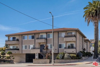 Welcome to this bright and inviting 2-bedroom, 1-bath end-unit - photo 2