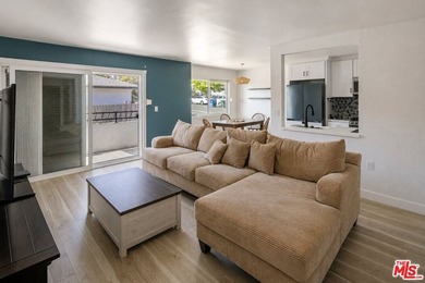Welcome to this bright and inviting 2-bedroom, 1-bath end-unit - photo 6