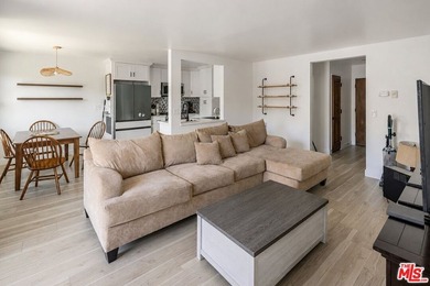Welcome to this bright and inviting 2-bedroom, 1-bath end-unit - photo 7