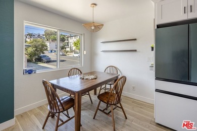 Welcome to this bright and inviting 2-bedroom, 1-bath end-unit - photo 8