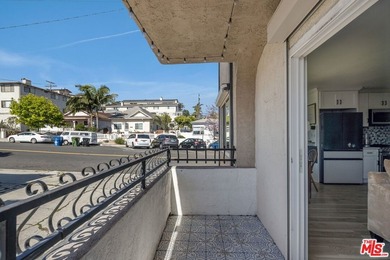 Welcome to this bright and inviting 2-bedroom, 1-bath end-unit - photo 10