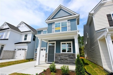 This home pairs soft sage-green and elegant frost gray cabinetry - photo 2