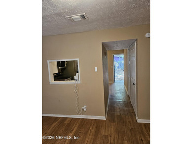Move-in-ready 3-bedroom, 1.5-bath townhouse featuring a new roof - photo 2