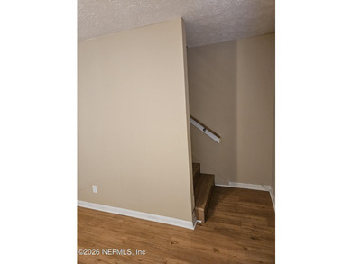 Move-in-ready 3-bedroom, 1.5-bath townhouse featuring a new roof - photo 3
